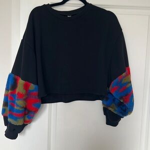 Black sweater‎ with colorful sleeves